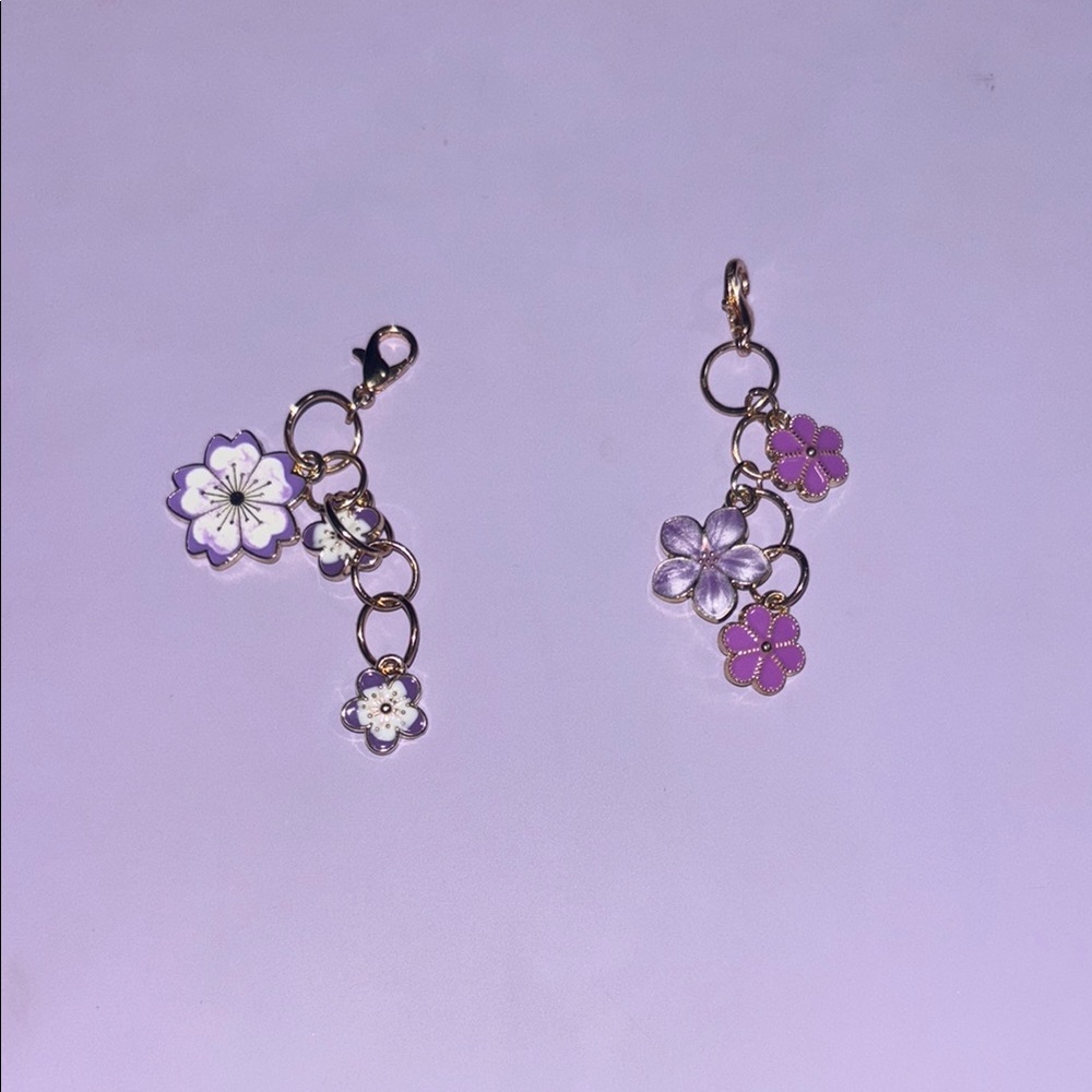 Purple white and gold keychains